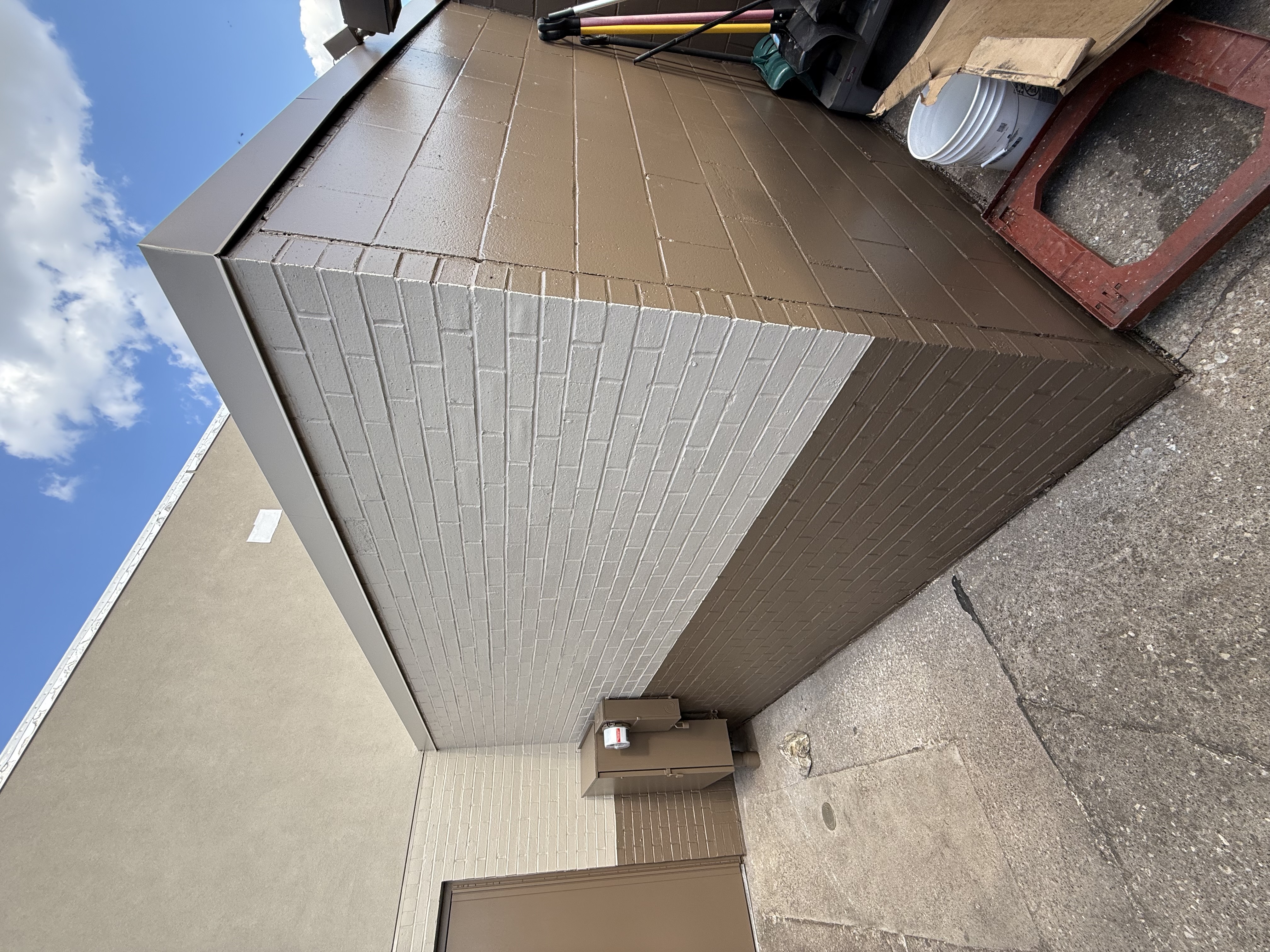 After: Commercial brick and stucco exterior
