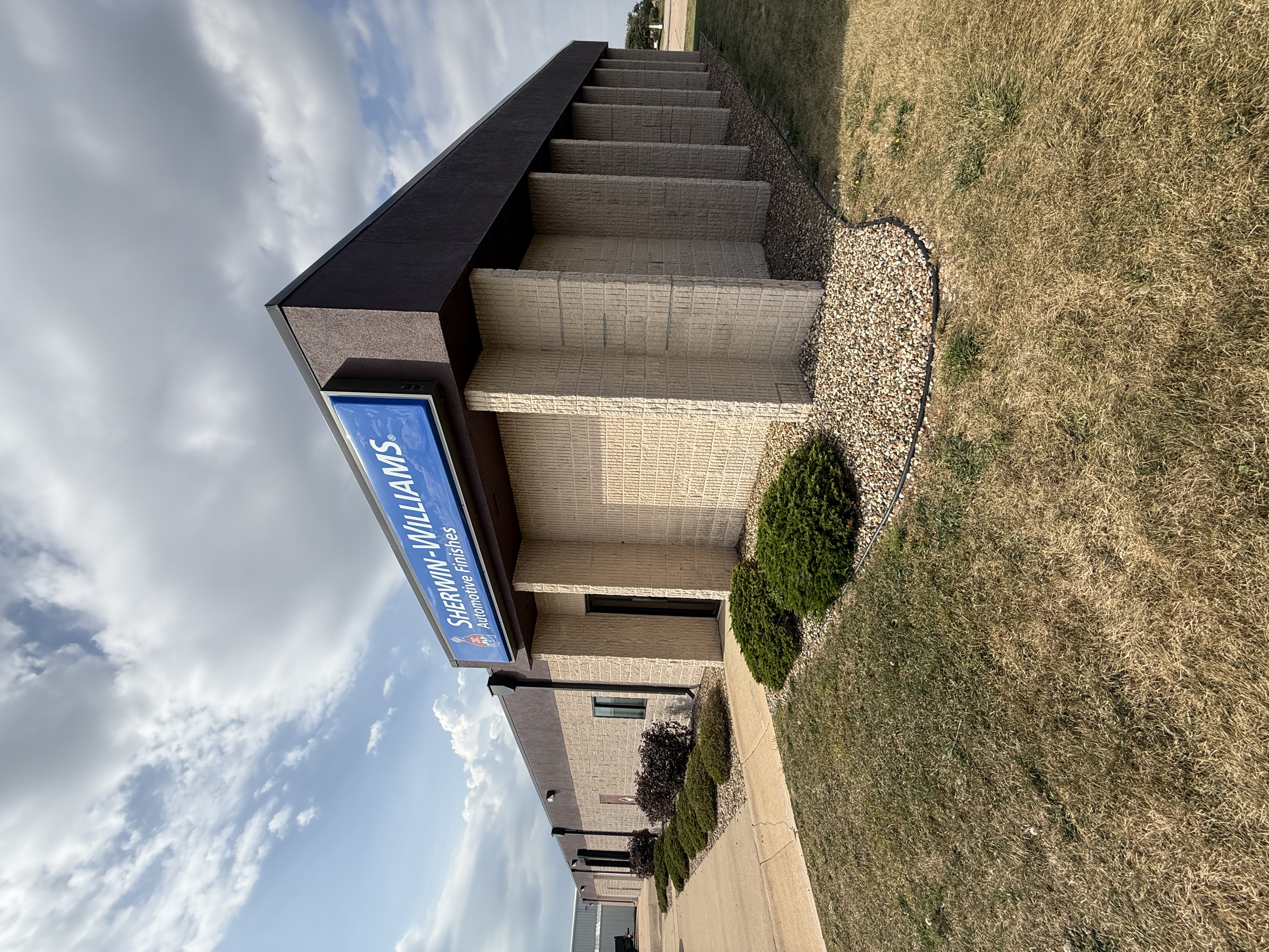Sherwin-Williams facility exterior painting completed by Maverick Painting