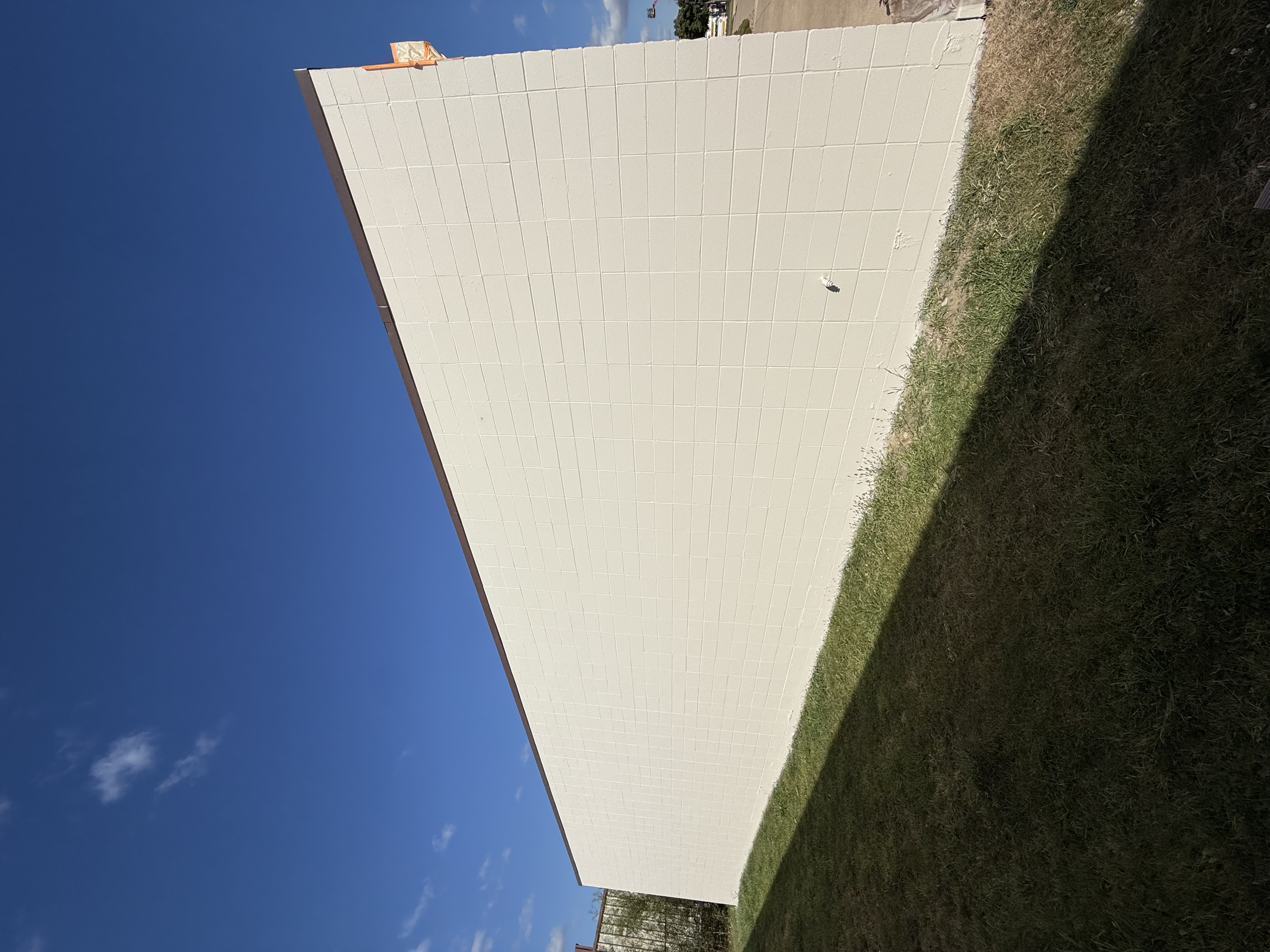 After: Commercial building exterior, cinder block transformation